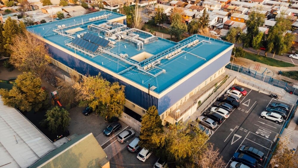 Green metal roof on a modern medical building.