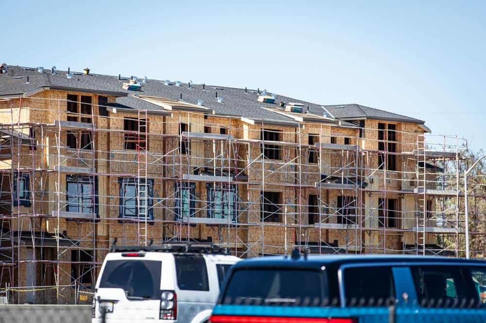 apartment construction shows one of the roofing types of California apartment buildings.