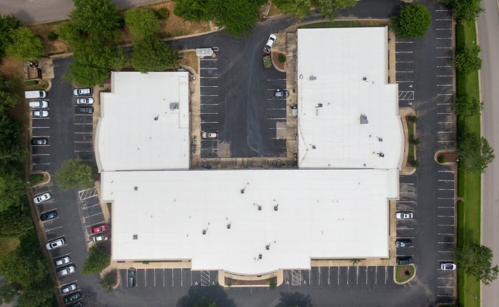 TPO roofing systems help commercial buildings protect large flat roof surfaces while improving energy efficiency and long-term roof performance.