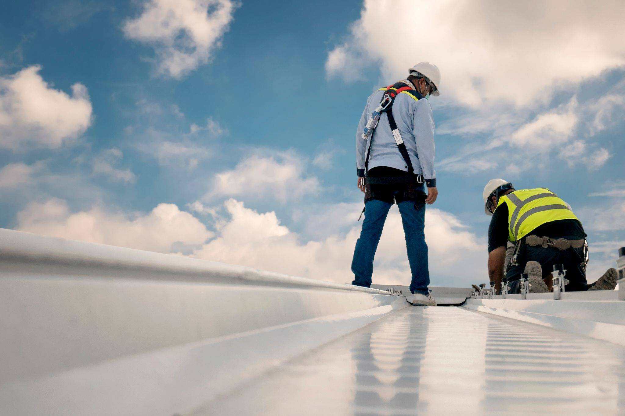 Panel type and attachment method affect installation costs and overall project scope of commercial metal roofing